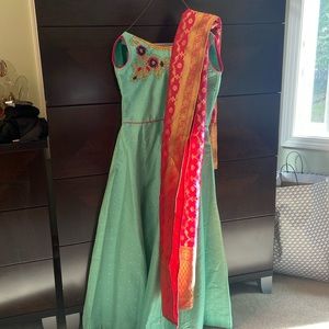 Green Indian suit for girls with pink pants and pink and gold dupatta